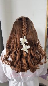 Flower girl braid and curls hairstyle in Cancun, Mexico by Doranna Wedding Hairstylist & Bridal Makeup Artist