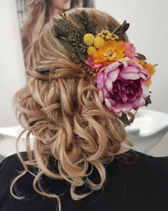 Romantic bridal updo with curls by Doranna Wedding Hairstylist & Bridal Makeup Artist in Playa del Carmen, Mexico